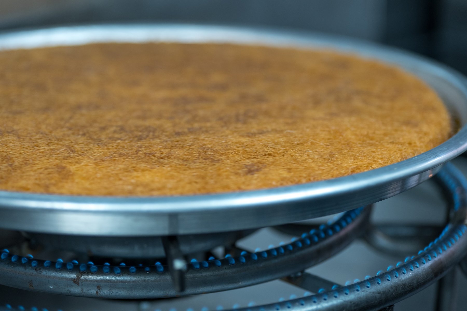 A large round tray of kunafa